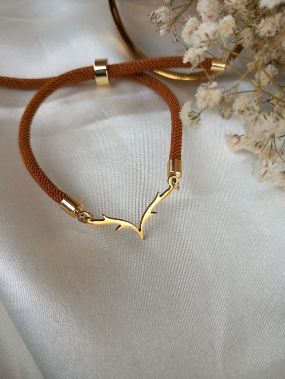 دستبند زنانه مارشال قهوهای با پلاک استیل شاخ گوزن