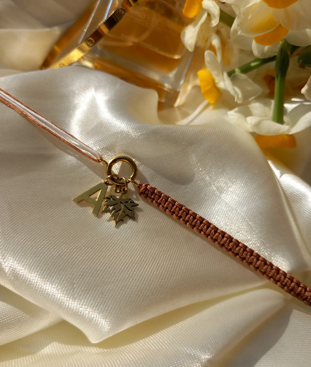 دستبند زنانه استیل با بند قهوهای مدل برگ پاییزی