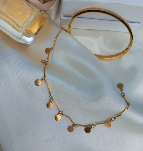 دستبند زنانه پولکی استیل طرح طلا