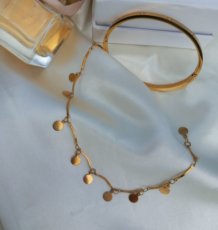 دستبند زنانه پولکی استیل طرح طلا