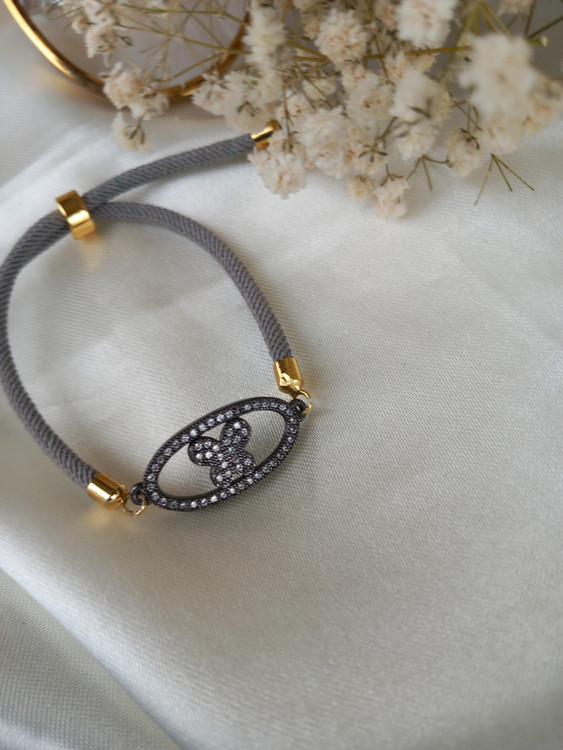 دستبند زنانه مارشال طوسی با پلاک پروانه