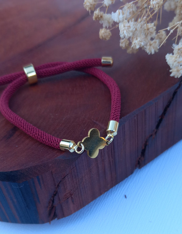 دستبند ونکلیف استیل با بند مارشال زرشکی