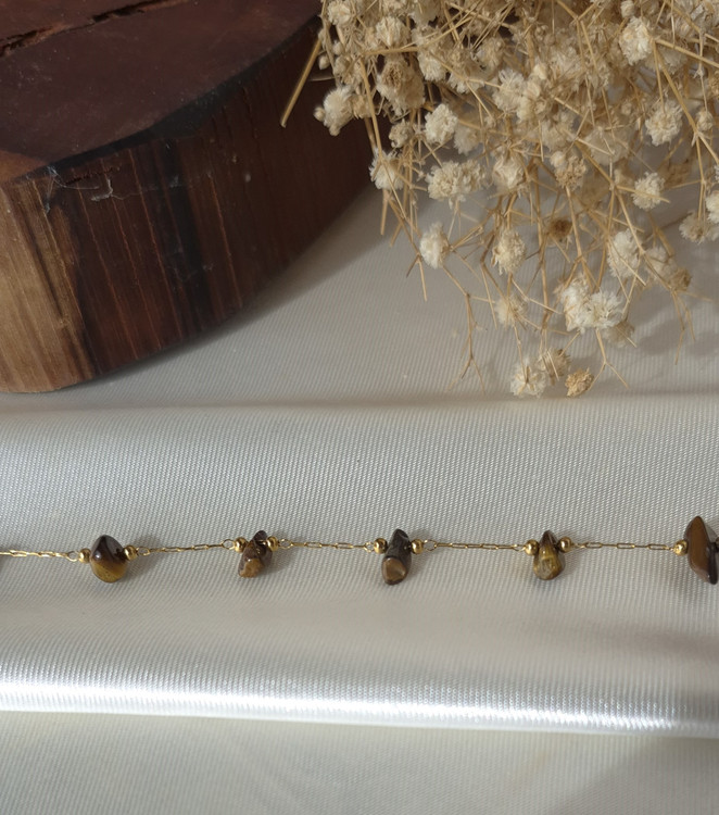 دستبند زنانه استیل طلایی با سنگ چشم ببر طبیعی