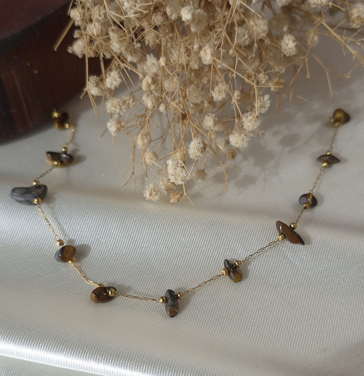 دستبند زنانه استیل طلایی با سنگ های دفرمه طبیعی چشم ببر