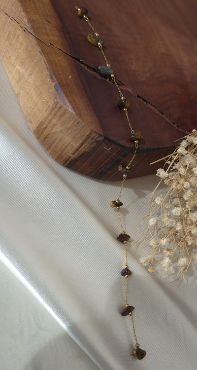 دستبند زنجیر استیل طلایی با سنگ چشم ببر