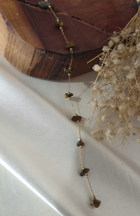 دستبند زنانه زنجیر استیل طلایی با سنگ چشم ببر طبیعی